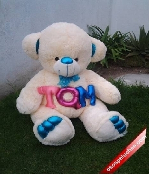 Imagen de Oso de peluche grande blanco huellas azules numero 0