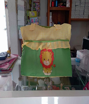 Imagen de Pañalera para bebe leoncito color verde con amarillo