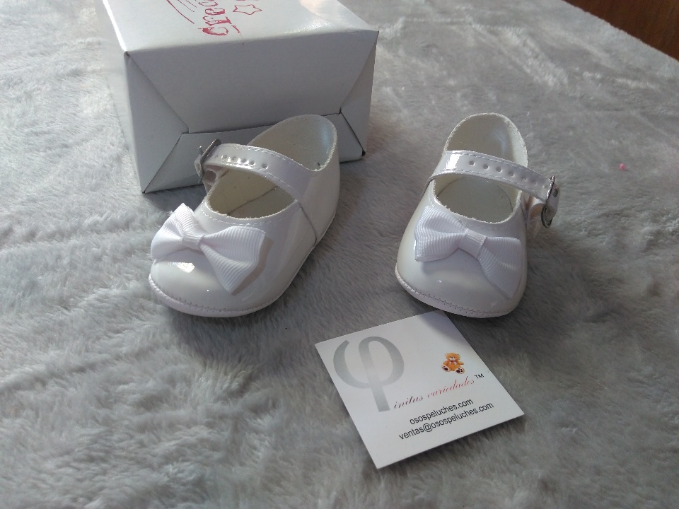 Imagen de Zapatitos para bautizo blancos con moño numero 1